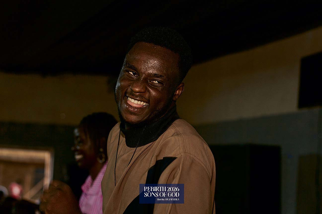 A smiling adult at the gathering.